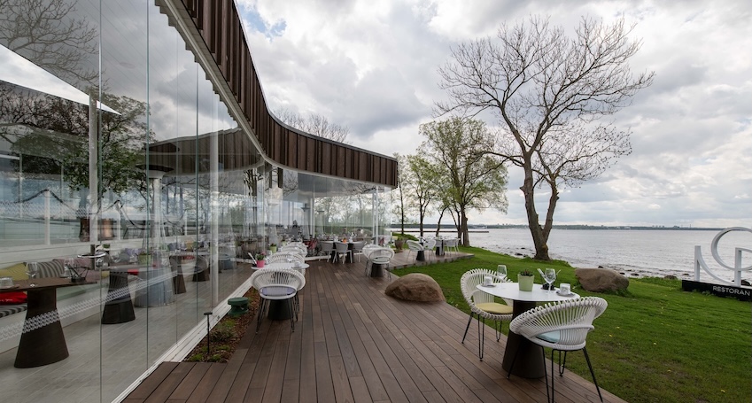 Thermory decking next to glass building