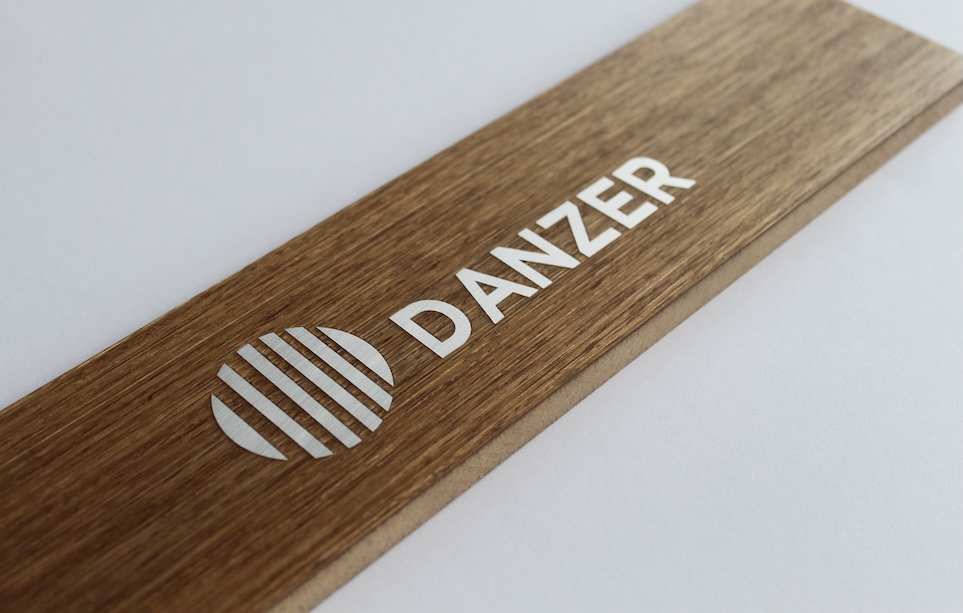 Wood with Danzer logo inlay